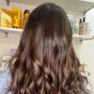 Glossy brunette hair colour for spring at the salon in langley park