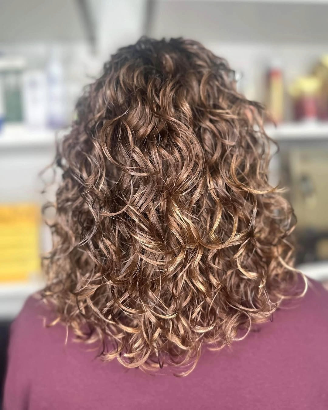 Permed hair that has been highlighted with sun kissed blonde tones at The Salon, Langley Park in Durham Permed hair that has been highlighted with sun kissed blonde tones at The Salon, Langley Park in Durham