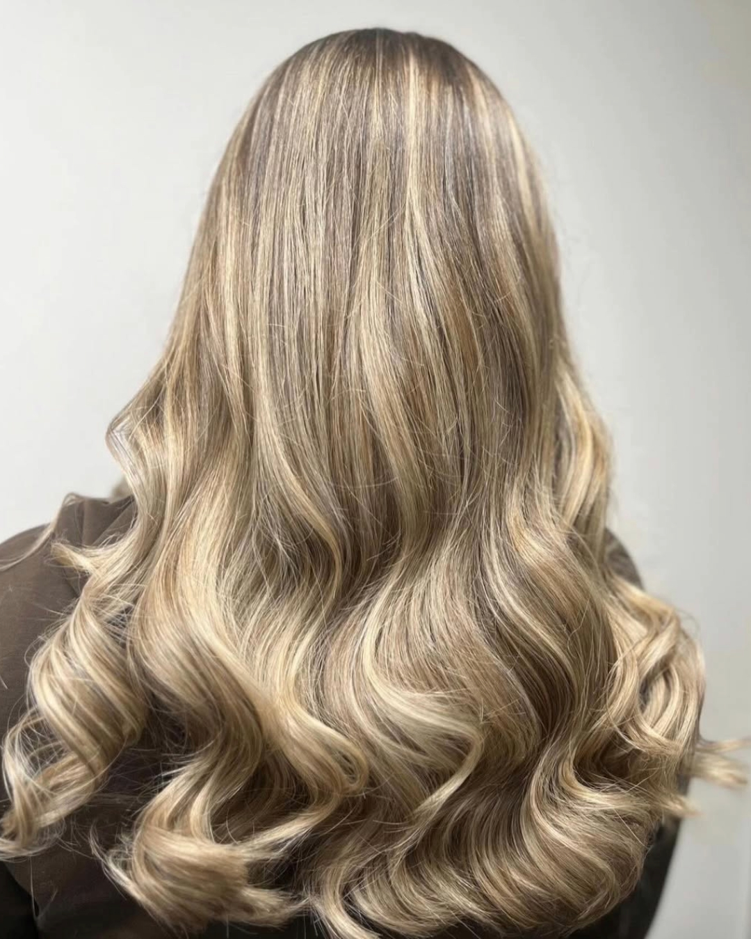 Professional balayage with face-framing money piece at The Salon Langley Park